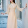Áo dài Kim Vàng họa tiết hao thuê vải tơ 4 tà 9 IMG 100045 0 scaled
