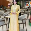 Áo dài lụa tơ tằm tintan thiết kế vân nổi trẻ trung cho nàng diện tết, đính kết thủ công