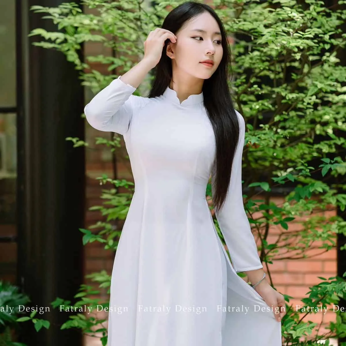 Áo dài Thanh Ngọc trắng vải lụa Thái Tuấn Fatraly 7 662e4b09dbab4e13ac6d1f45755f61f0tplv o3syd03w52 origin jpeg